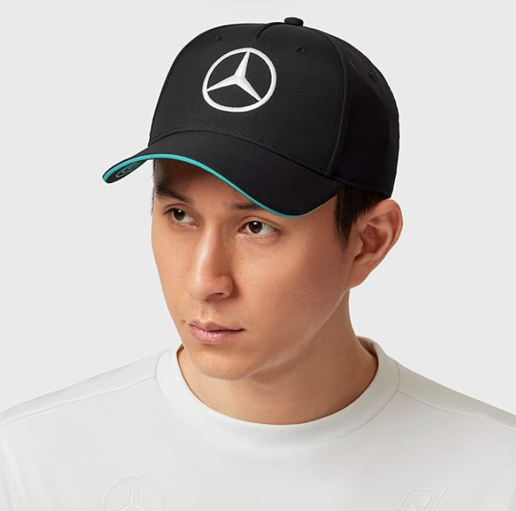 Black Mercedes-AMG Petronas team cap with a teal brim edge, worn